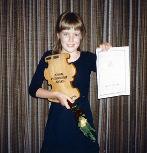 Me with my award for a play about my disaster zone of a childhood bedroom.